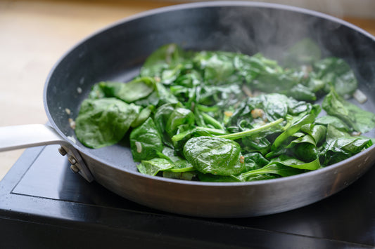 Greens cooking in a skillet